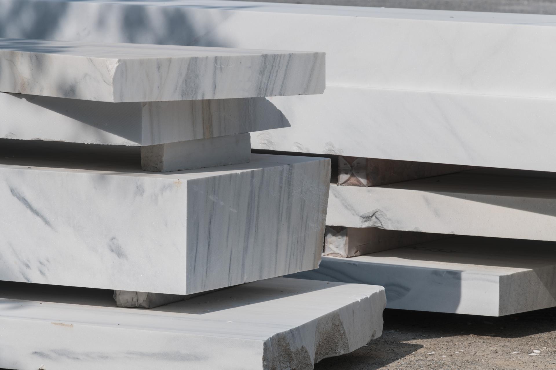 white marble slabs and blocks on stockyard