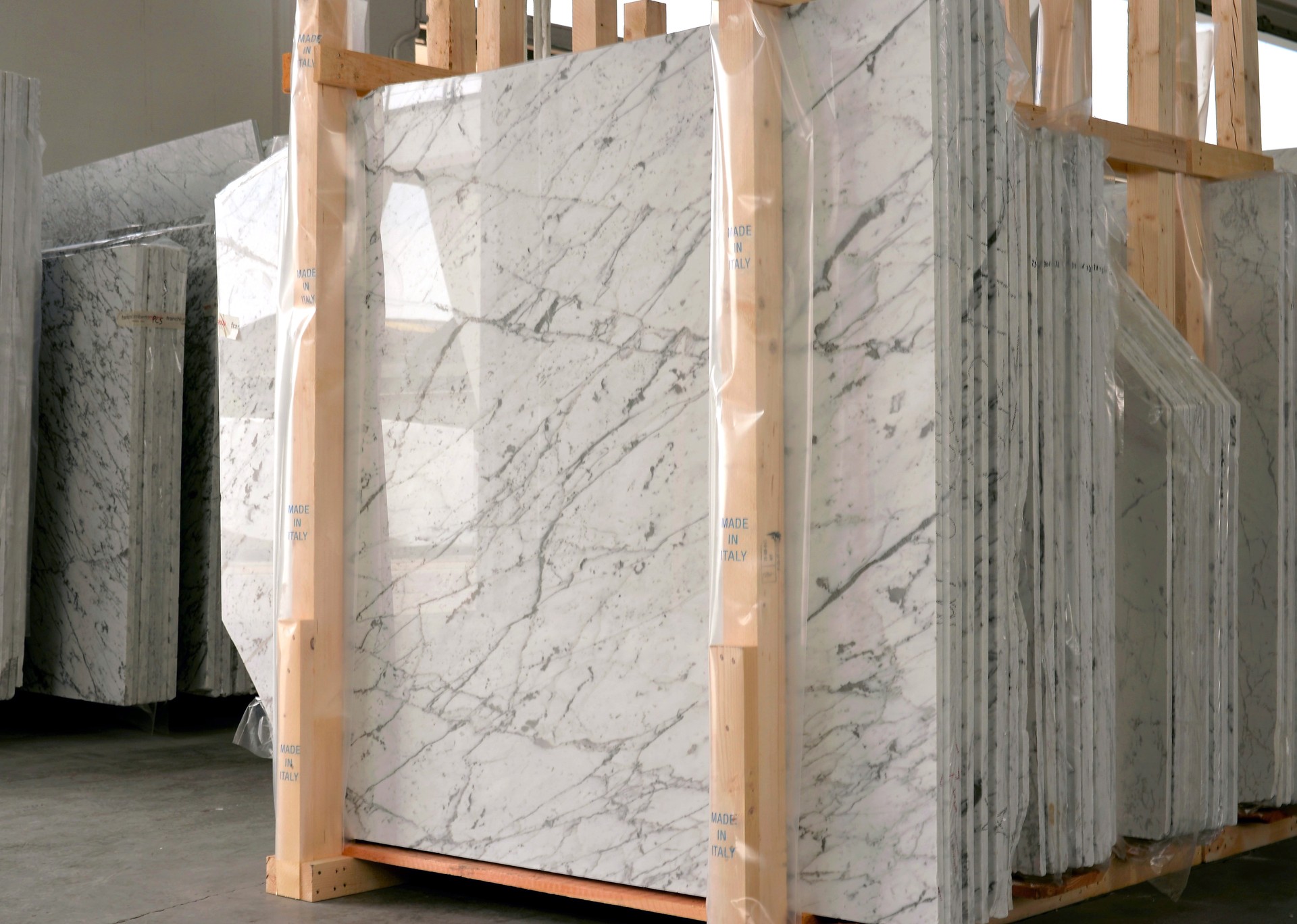 stack of marble o stone slabs - marble industry factory. Luxury interior material in natural stone.